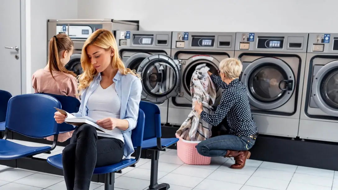 Humidity control and drying for communal laundry rooms