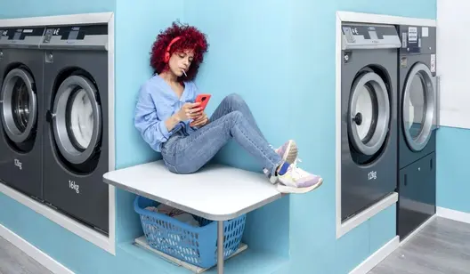 Air cleaning for communal laundry rooms