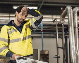 Tired engineer worker hard work fatigue male staff factory hot weather